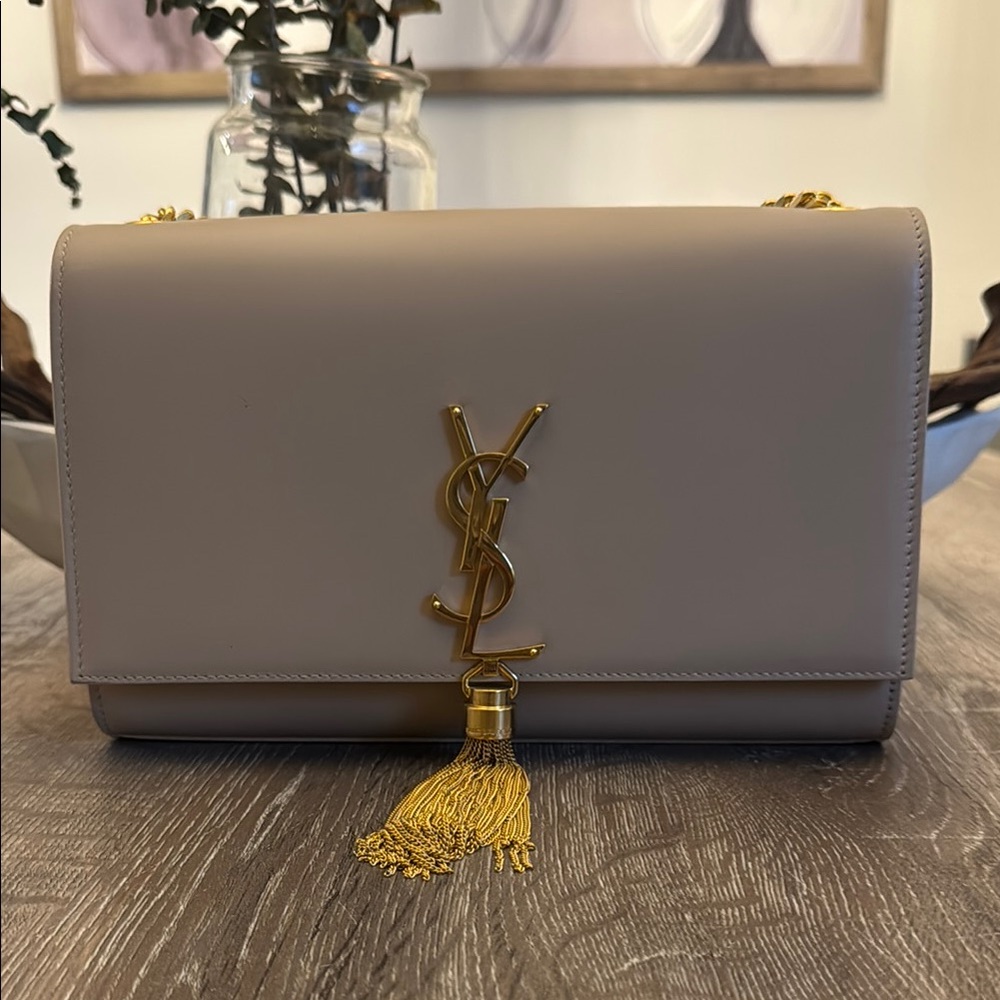 Yves Saint Laurent Cream and Gold Crossbody Bag with Iconic Tassel